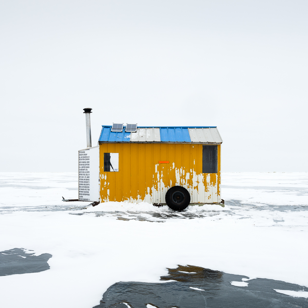 1st Place; Ice Fishing Huts, Lake Winnipeg by Sandra Herber
