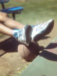 Shoes on a Basketball