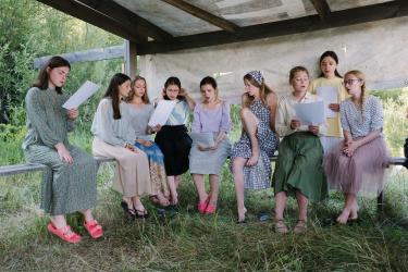 Theologians. Students rehearse hymns for the liturgy.