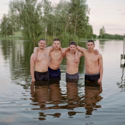Rokas and his friends having an evening swim together. Onuškis, Lithuania, 2022.